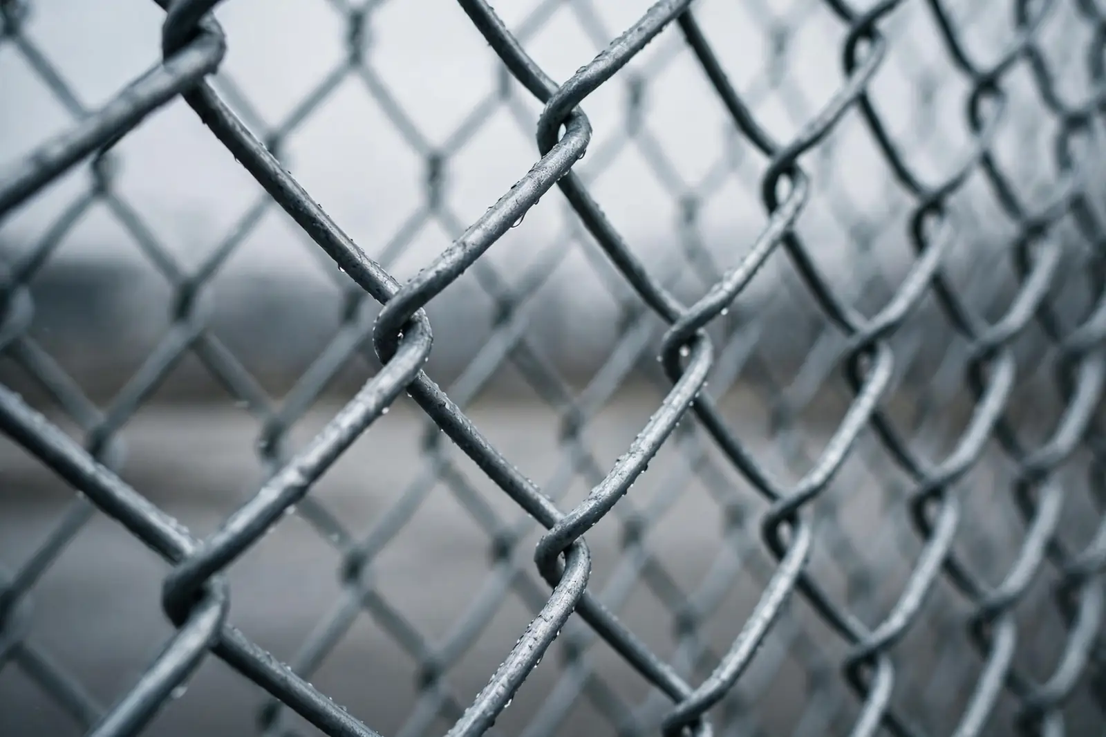 Close-up of galvanized chain-link diamond mesh